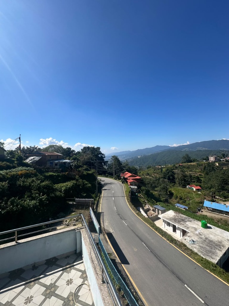 Hotel Road Side Nagarkot scenic road and valley view from balcony